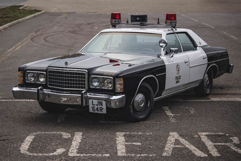 Has minor rust on the bottom of the quarter panels. . 1970s police cars for sale